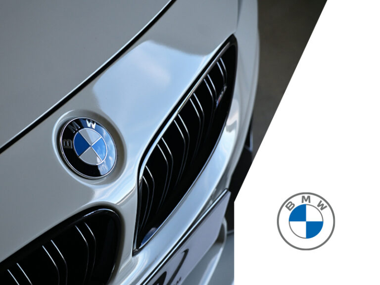 Nahaufnahme der Front eines BMW Fahrzeugs mit BMW Emblem und Kühlergrill. Das Bild symbolisiert modernes Aftersales Marketing, CRM Lösungen, CRM Integration DMS, Datenmanagement, Digitalisierung und Kundenbindung für BMW Autohäuser und Händlergruppen